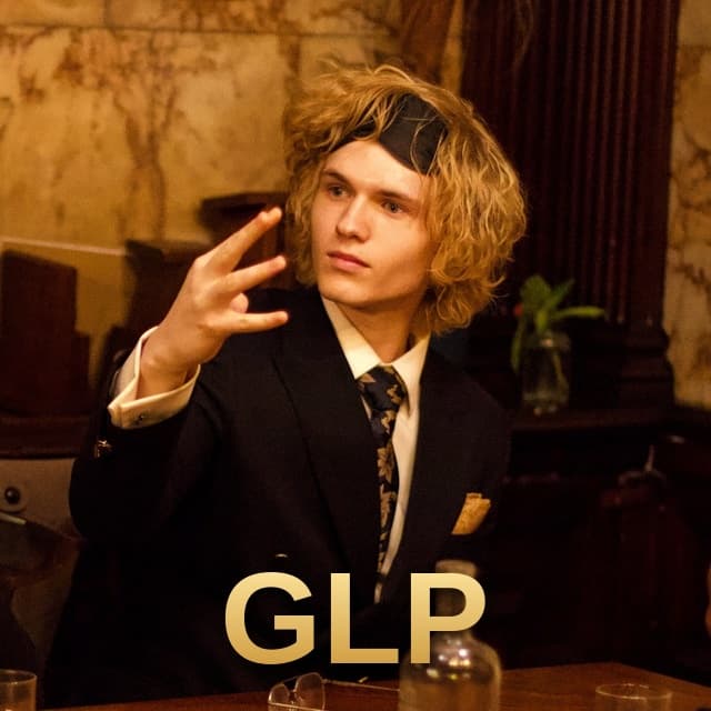 The same photo of Sam Human in a warmly lit bar, with the letters GLP in gold across the bottom